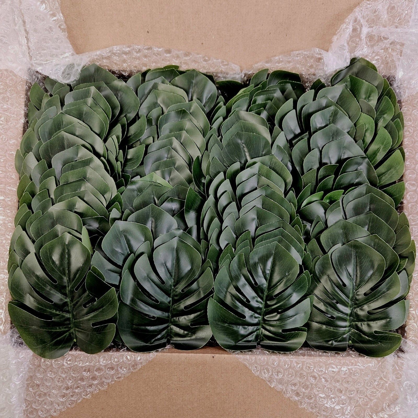 Maison Charlô | Wholesale Box 50 or 100 or 160 Green Monstera Leaf Napkin Rings for events, wedding, party